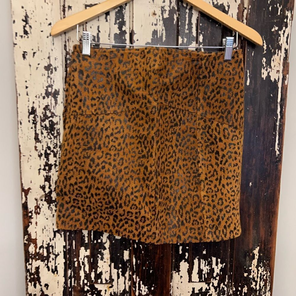 Women’s
Leather animal print skirt. Size M.